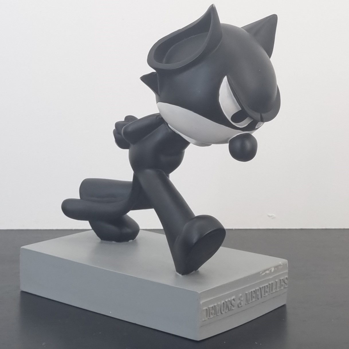 Felix the Cat pacing in thoughts figurine