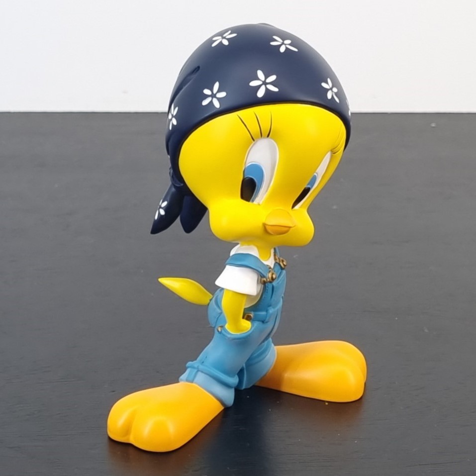 Tweety Bird wearing a denim overall with bandana figurine