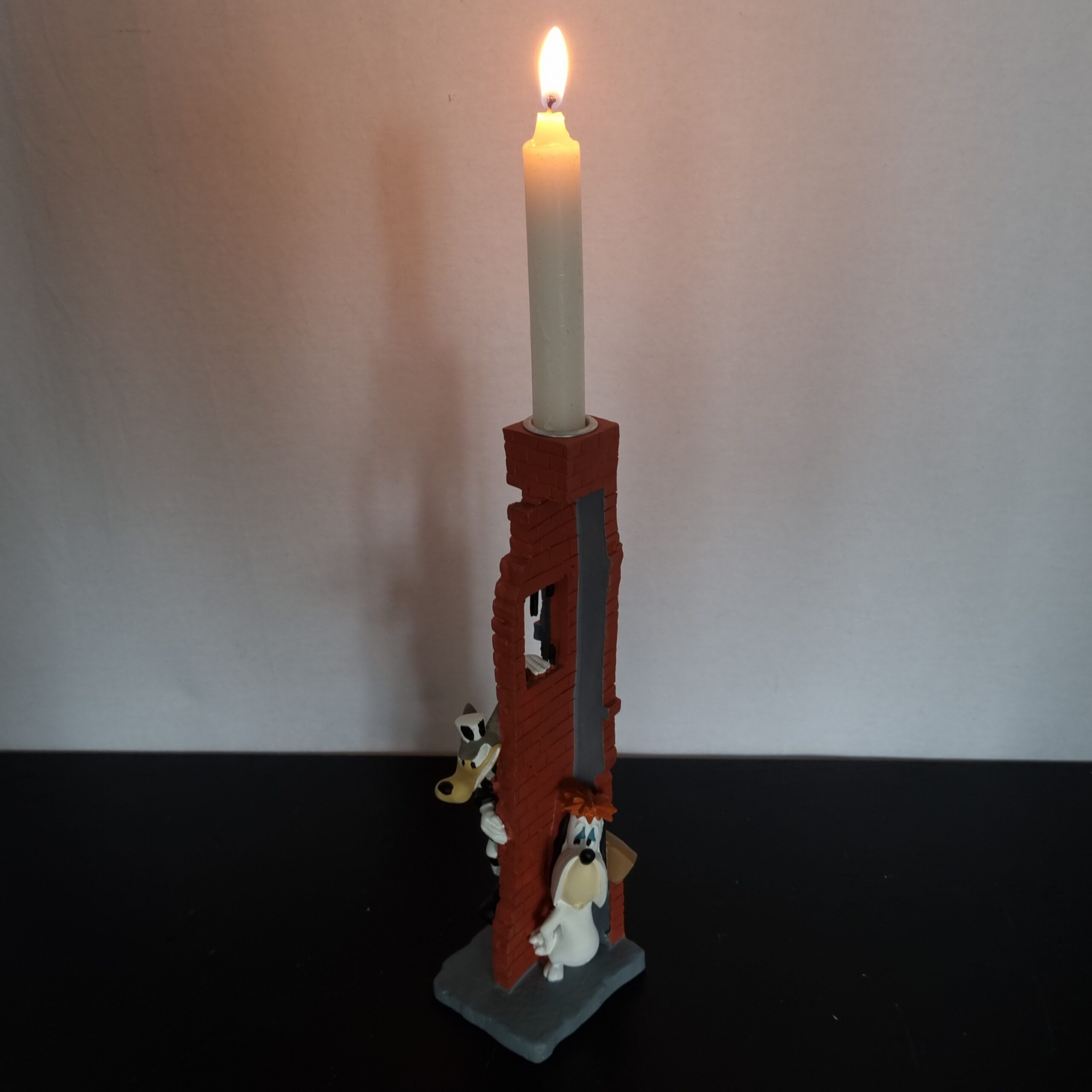 Droopy and Wolf candle stand