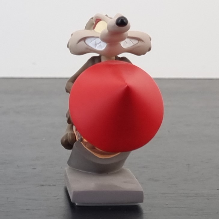 Wile E Coyote on a rocket figurine _front