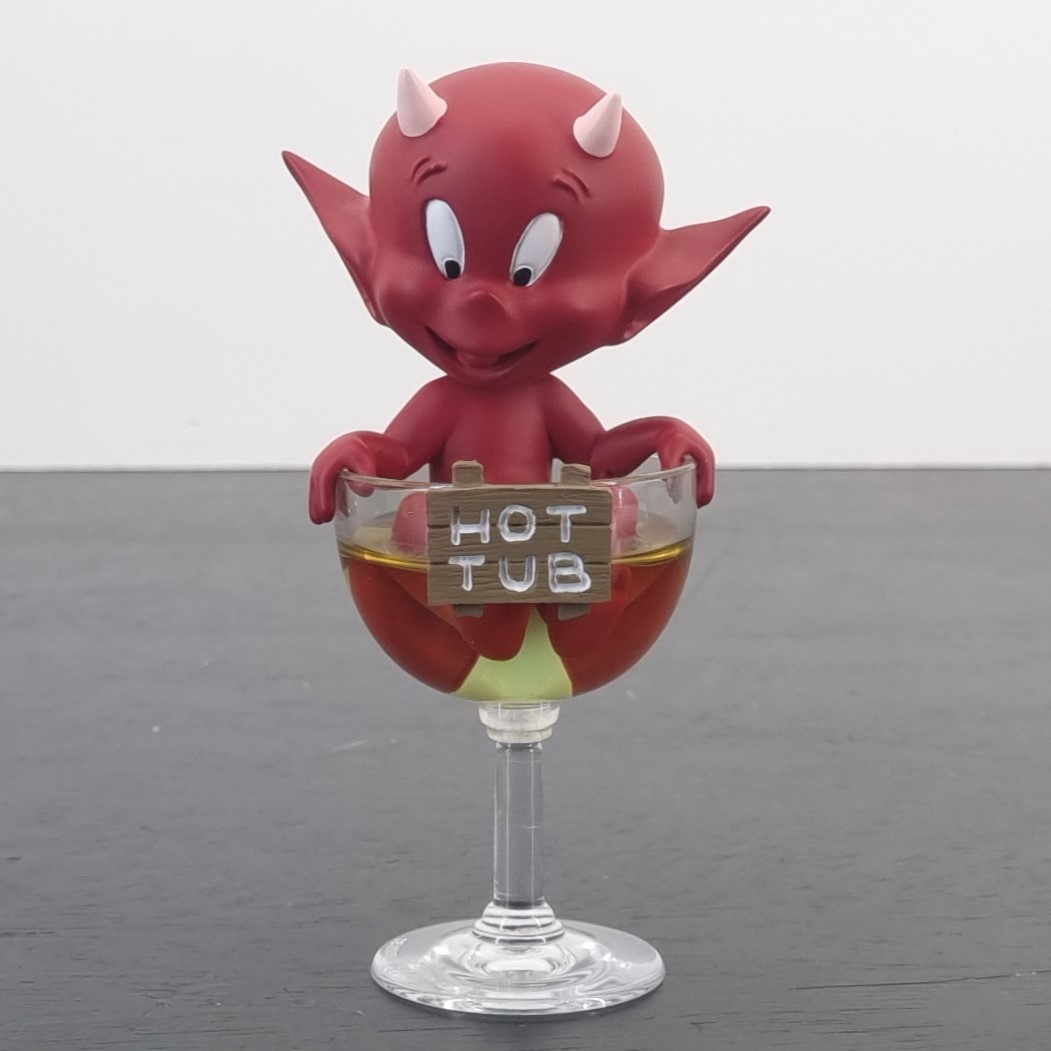 Hot Stuff sitting in a glass