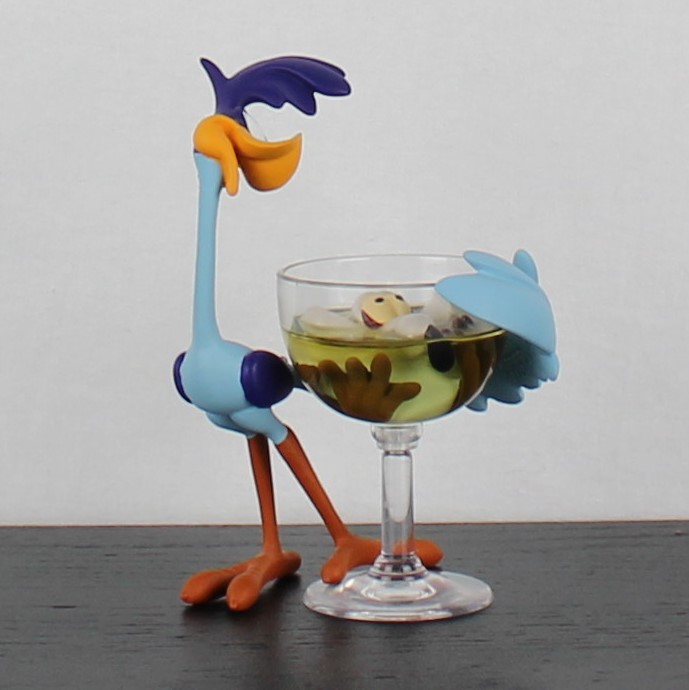 Road Runner with Wile E Coyote in a glass figurine