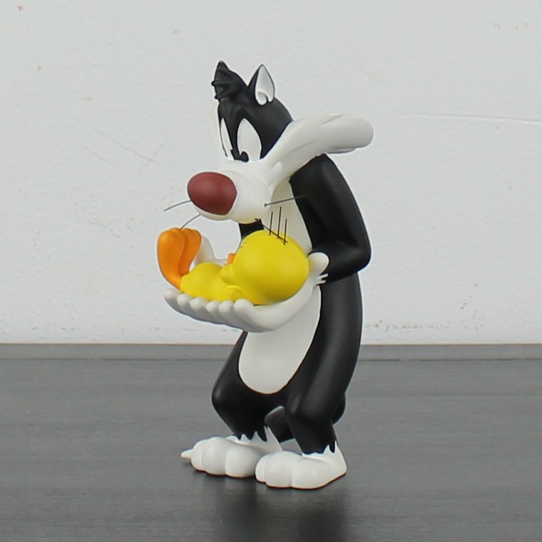 Sylvester the Cat holding Tweety Bird figurine _left front