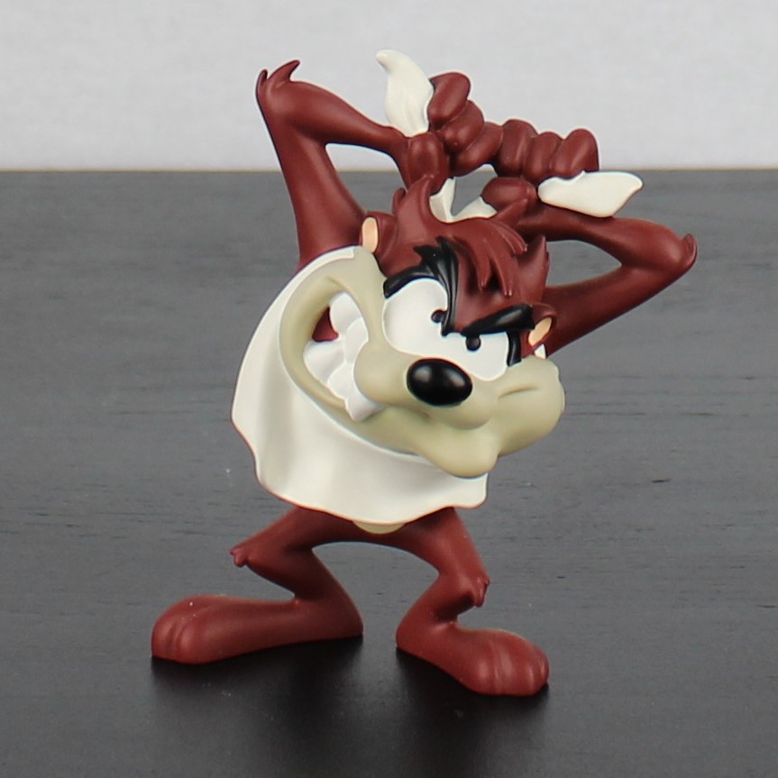 Tasmanian Devil puts on a bib figurine