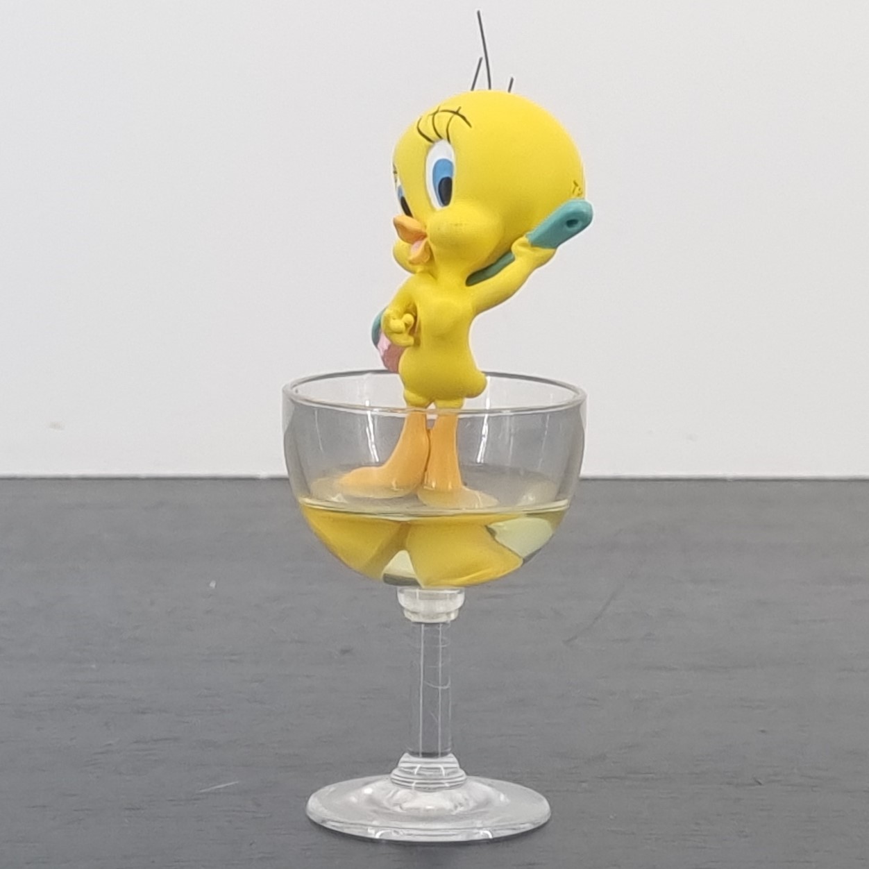 Tweety Bird bathing in glass figurine _left front