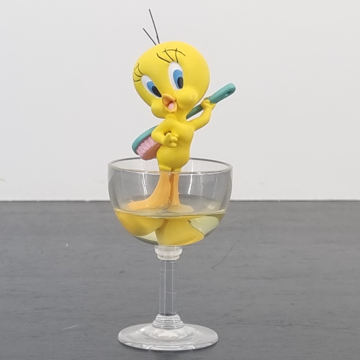 Tweety Bird bathing in glass figurine